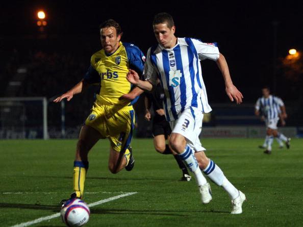 Plays as a centre back for League One club Rochdale. Now 35.