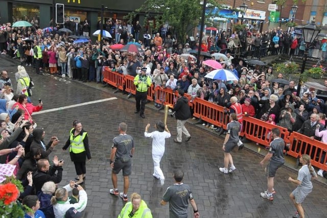 The torch makes its way through Wellingborough town centre