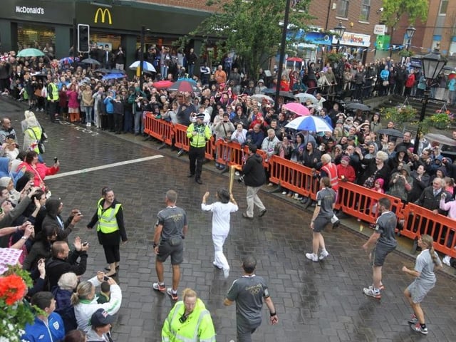 The torch makes its way through Wellingborough town centre