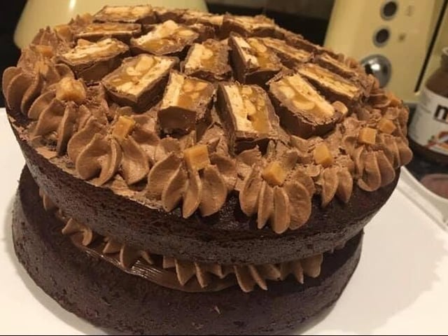 Charlotte Milner's chocolate snickers cake SUS-200414-150638001