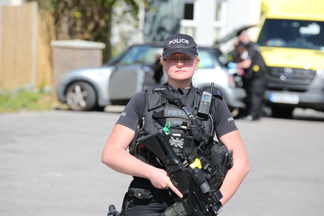 An armed officer at the scene