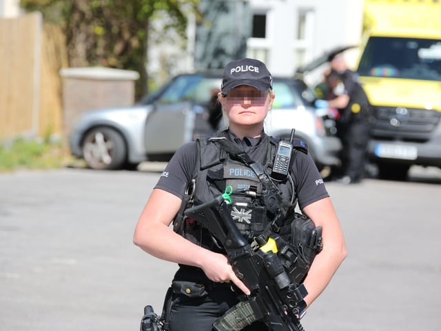 An armed officer at the scene