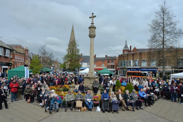 How it should have looked: Crowds gather during the Churches Together Good Friday Service on the Square in Market Harborough in a previous year.