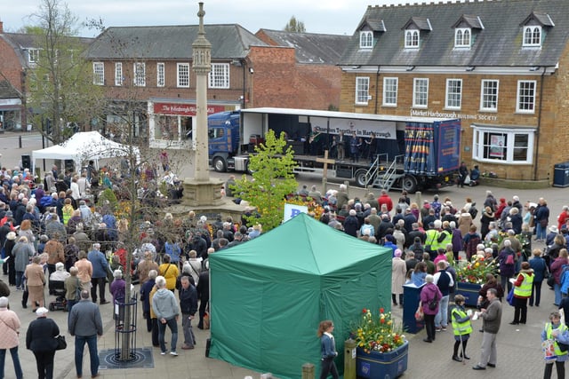 How it should have looked: Crowds gather during the Churches Together Good Friday Service on the Square in Market Harborough.