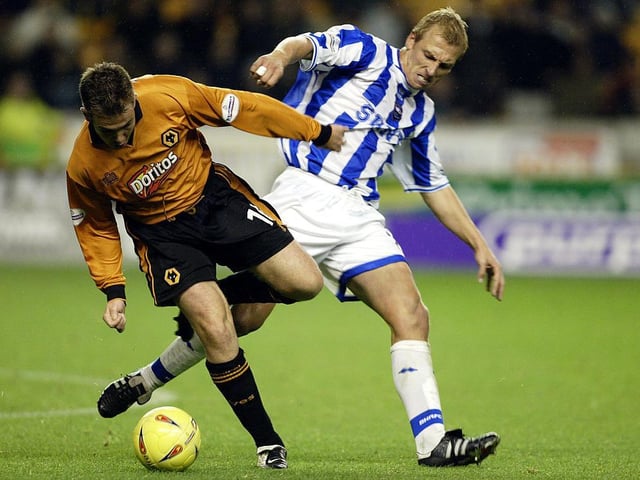 Fearsome in midfield. Involved in 'The Battle of Longford' during a pre-season tour to Ireland in July 2001. Carpenter was subbed after 15 minutes for 'arguing' with his own player (Matt Wicks). The match was abandoned at halftime due to a number of mass brawls.