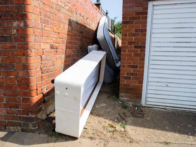 A bed and a mattress in Countess Road, Dallington. Photo: Leila Coker