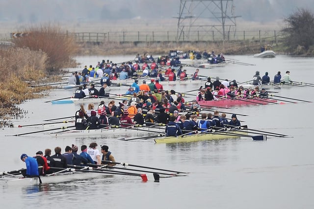 This photo is taken from the ‘Tin Can Bridge’ at the start of the Head of the Nene rowing race. The long lens foreshortened the picture. The river wasn’t really this crowded.
