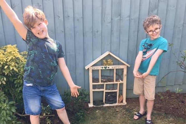 Josh and Ben Kennard, with the 6th Banbury Scouts, make a bug hotel