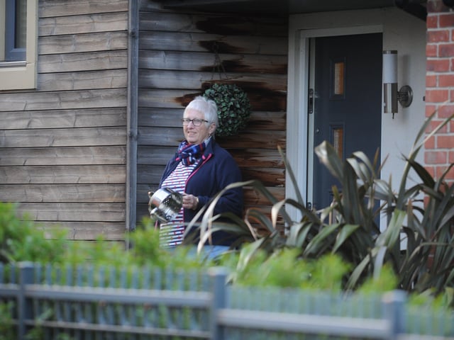 Residents from the Hawksbill Way area off London Road clapping for the NHS EMN-200423-220348009