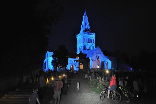 The Church of St Kyneburgha, Castor mlite in blue light in support of the NHS EMN-200423-220158009