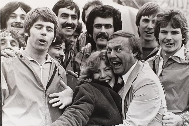 Disgraced TV presenter Stuart Hall with members of the Corby team
