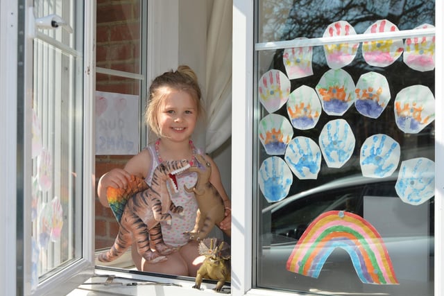 Betsie Munks, 4, waits for T-Rex Tim in South Kilworth.