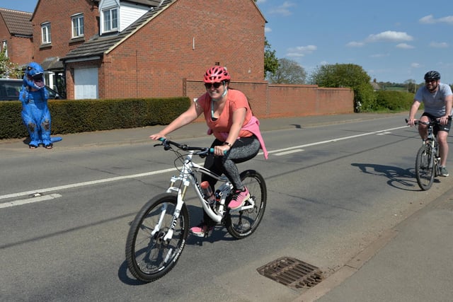 T-Rex Tim shocks cyclists riding through North Kilworth.
