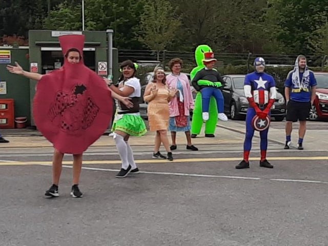 Posties donned fancy dress in memory of their colleague