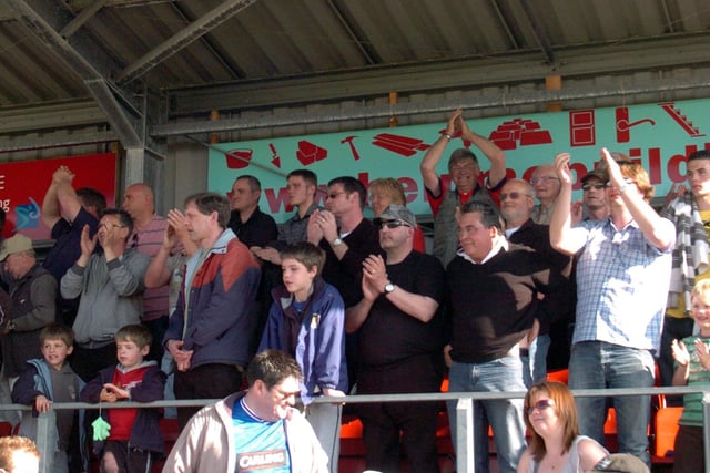 Fans cheer on the Borough against Oxford United