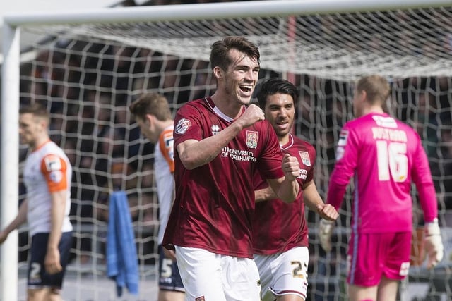 John Marquis is all smiles after putting the Cobblers 2-0 up against Luton