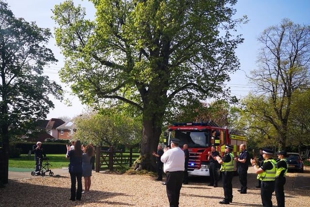Bedfordshire's police officers, firefighters and the East of England Ambulance Service visited Captain Moore on Thursday, April 16, to applaud his achievement and thank him for his amazing fundraising work on behalf of the county.