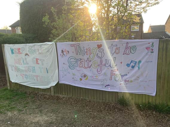 Kirsty Tinmouth sent these pictures of positive messages made by her friend Lizzie Bennett of Trefoil Close, Horsham, who has spent her time in isolation making the signs for her neighbours to see on their daily walks