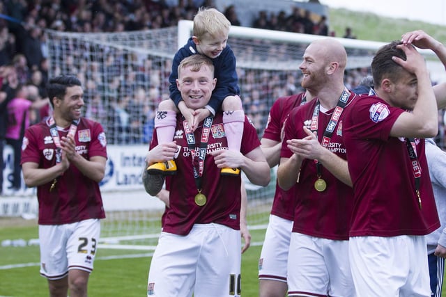 The Cobblers players were joined by family and friends on their Sixfields lap of honour