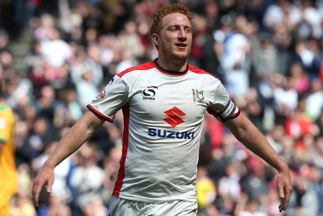 Dean Lewington scored twice against Yeovil to send Dons up