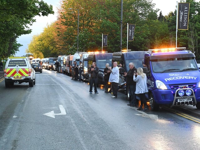 Vehicles from the convoy line up on Sibsey Road opposite the hospital.
