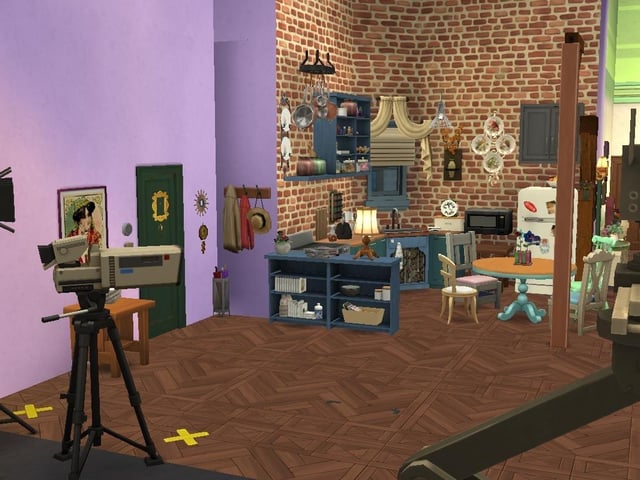 Ollie Armitage-Saunders, 26, from Chichester, recreated iconic TV and film sets on The Sims 4. Pictured is the set of Monica's apartment in the TV sitcom Friends