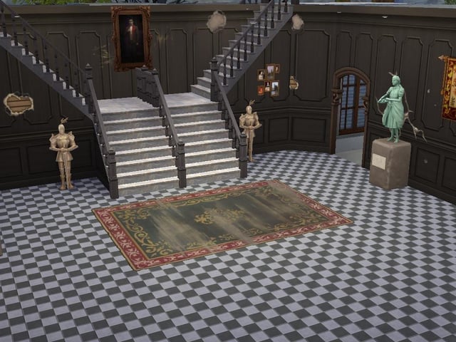 Ollie Armitage-Saunders, 26, from Chichester, recreated iconic TV and film sets on The Sims 4. Pictured is the house from The Addams Family