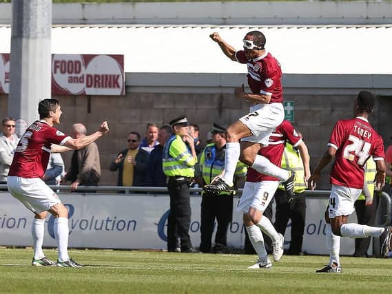 Mathias Kouo-Doumbe celebrates the third goal.