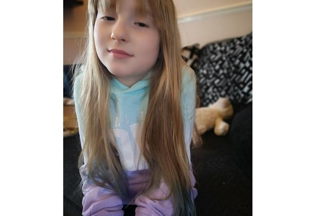 Eight-year-old Mia's mum sent in this photo of her quarantine hair style
