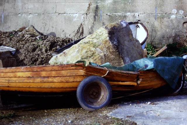 This boat was in the Hastings Motor Boat and Yacht Club compound under the cliffs at Rock-a-Nore when a large lump of rock fell on it during the storm of 1987