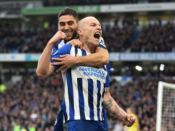 Neal Maupay and Aaron Mooy celebrate at the Amex