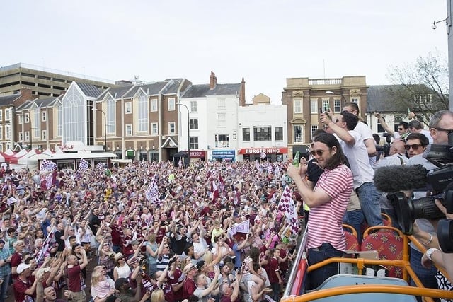 The players enjoyed a lap of honour around the Market Square