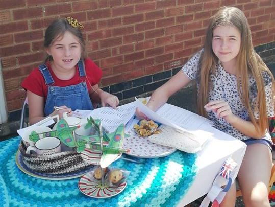 Tracy Arnold - Bella and Alana Arnold attempting to crack some morse code!