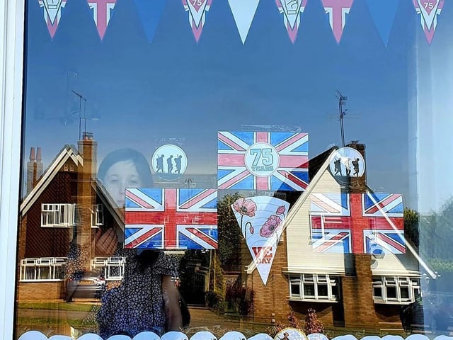 Kaye Milton - Our window is ready putting the bunting out this morning.