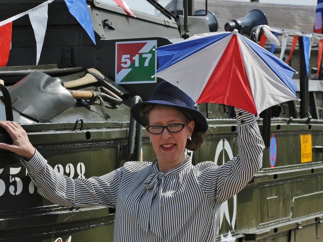 Rachael Peat singing on the WW2 DUKW EMN-200805-180024009