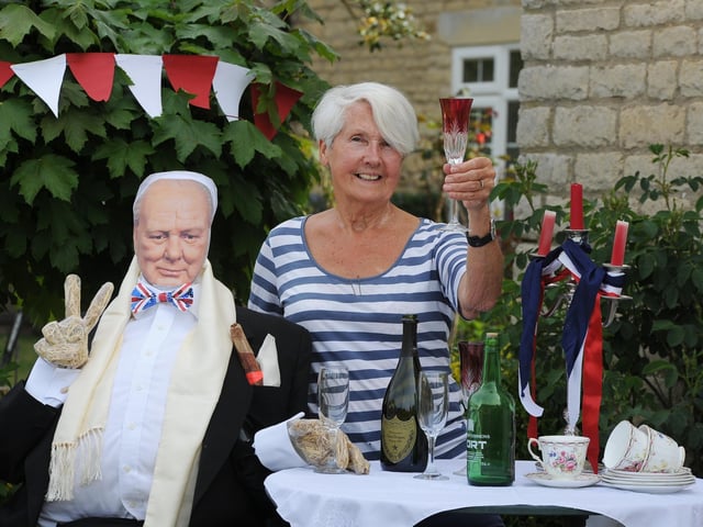 Sheena Wallace with her front garden display at Etton. EMN-200805-180120009