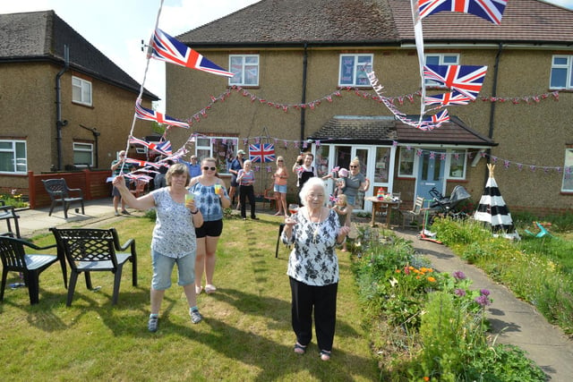 Dilys Leeder front right celebrates VE Day with family and neighbours in Lubenham.
PICTURE: ANDREW CARPENTER