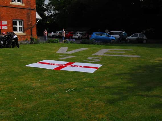 The gardener at St Andrew's Care Home in Ewerby marked out this on the lawn to welcome families for their VE Day themed drive-through visit to residents.