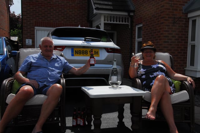 Sue and Nigel Hamblin of Sheldrake Road, Sleaford, enjoying a tipple on VE Day.