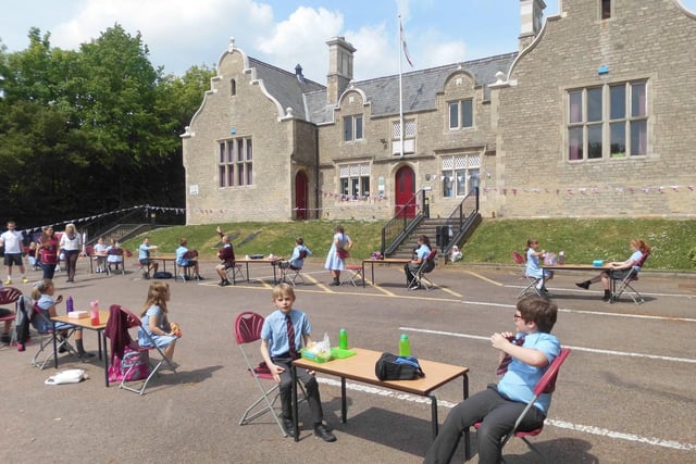 William Alvey School pupils enjoying their socially distanced VE Day tea party.