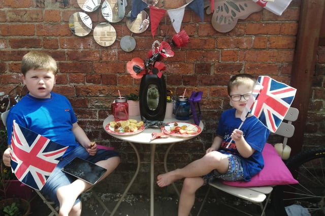 Jane Peck of Sleaford and her children enjoyed a stay at home garden party for VE Day.