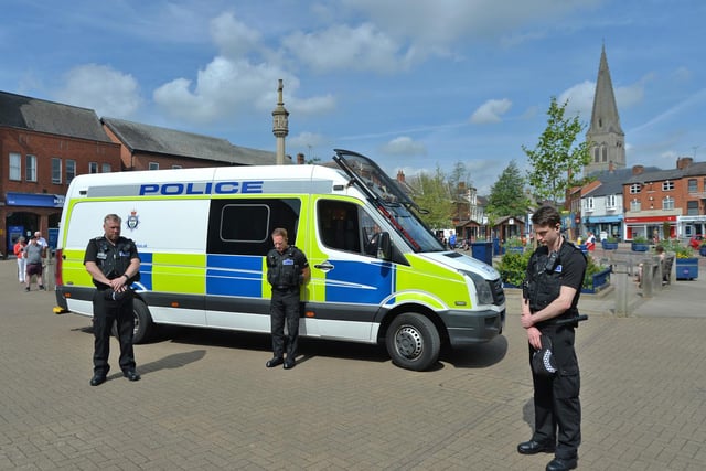 Police stand for two minute silence on the Square in Market Harborough.