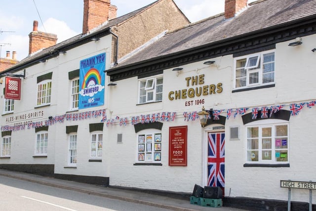 The Chequers decked out in flags