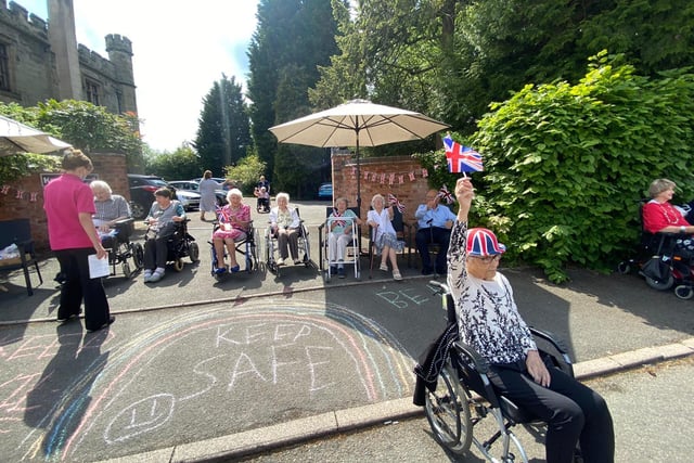 Residents at Kenilworth Manor celebrated the 75th anniversary of VE Day with a drive-by display.