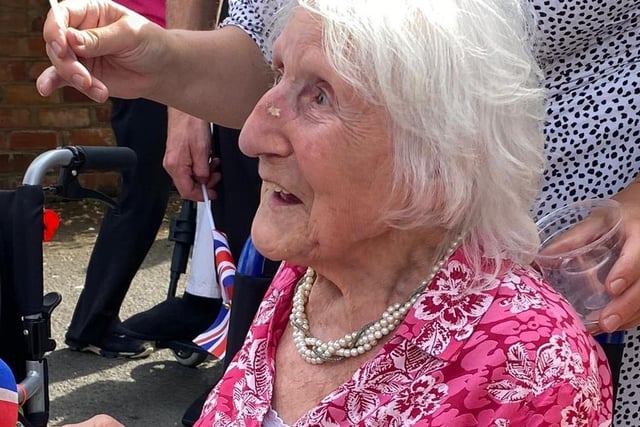 Residents at Kenilworth Manor celebrated the 75th anniversary of VE Day with a drive-by display.
