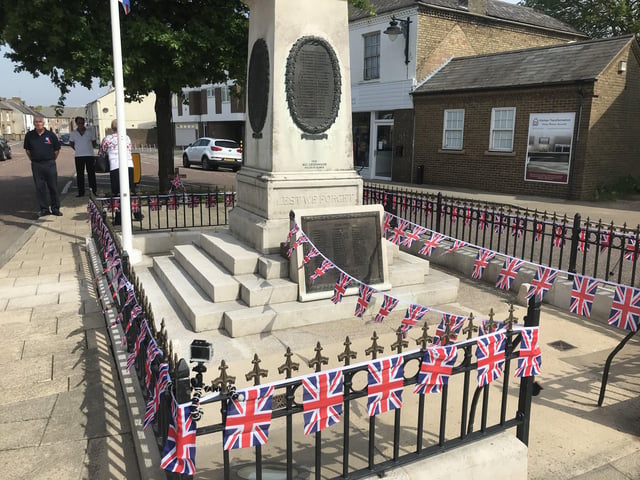Wreath laying at the Whittlesey war memorial on VE Day. Photo: Robert Windle