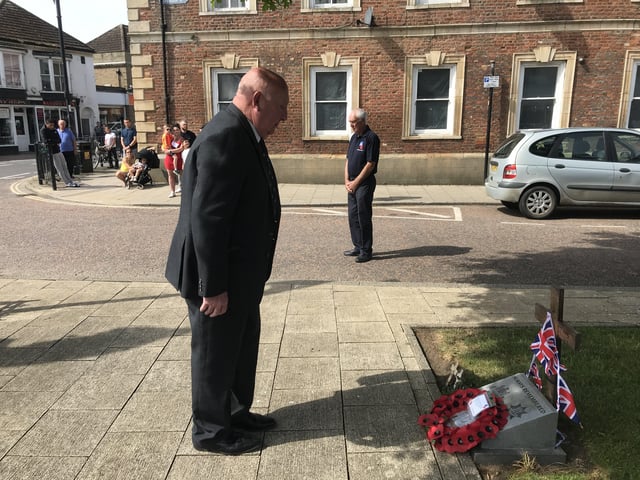 Wreath laying at the Whittlesey war memorial on VE Day. Photo: Robert Windle