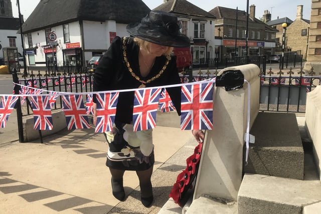 Wreath laying at the Whittlesey war memorial on VE Day. Photo: Robert Windle