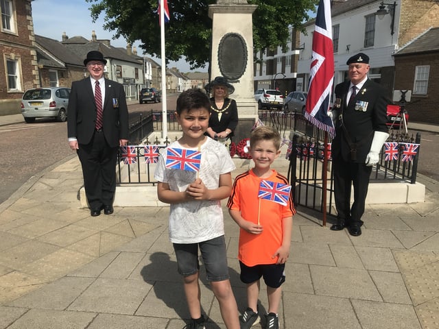Wreath laying at the Whittlesey war memorial on VE Day. Photo: Robert Windle