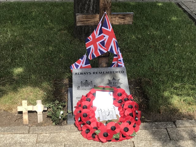 Wreath laying at the Whittlesey war memorial on VE Day. Photo: Robert Windle